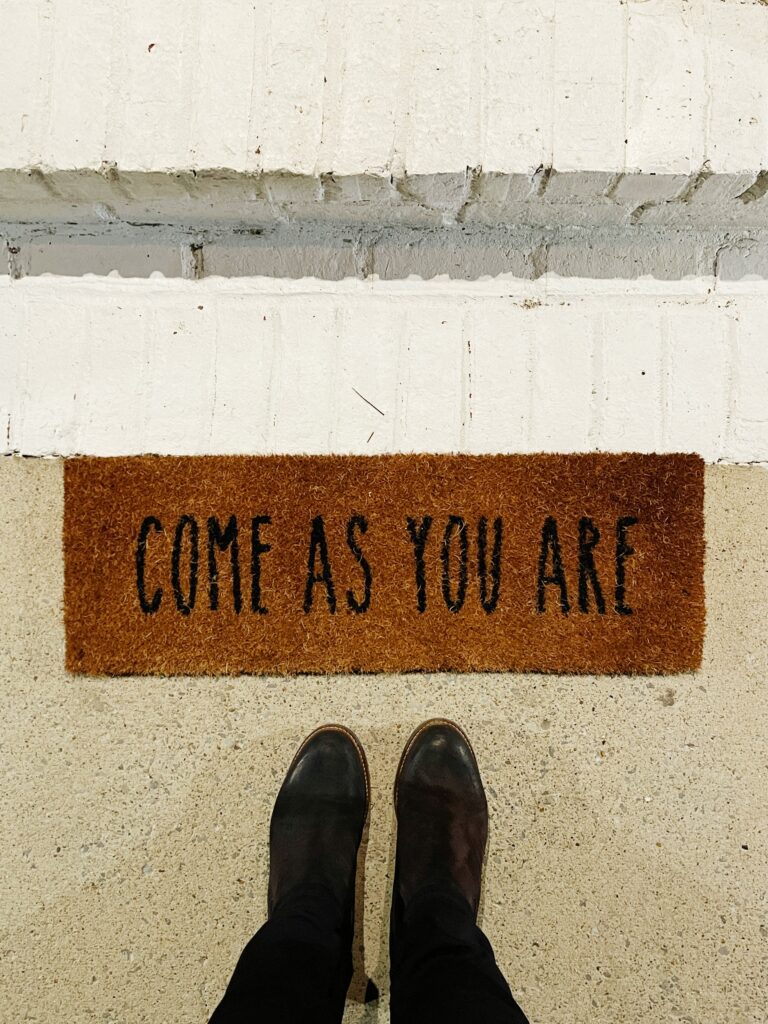come as you are mat, conveying the radical inclusion Christians are called to offer