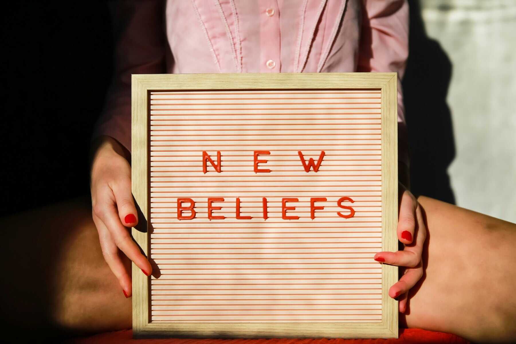 Sign saying "New Beliefs," inviting people to explore progressive Christianity